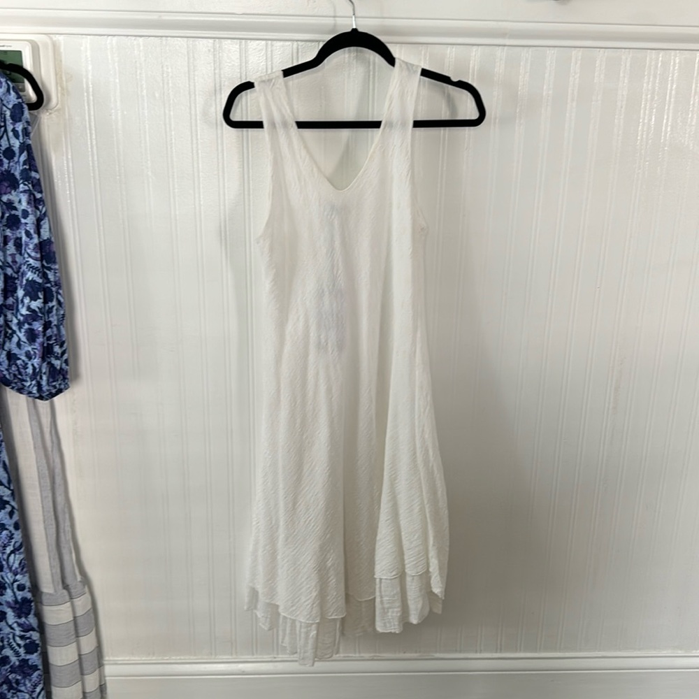 Sleeveless white asymmetrical midi dress